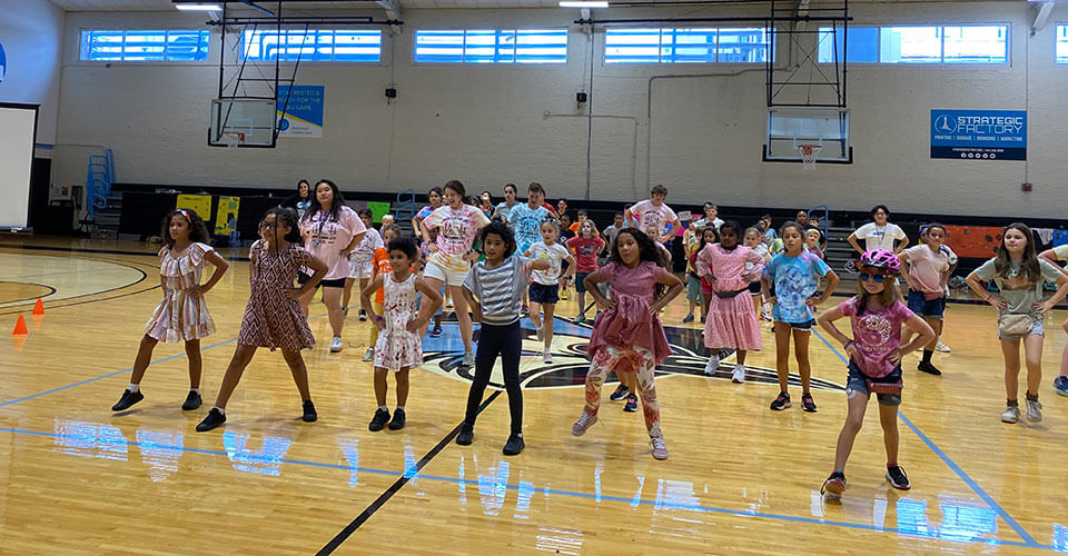 children doing line dancing
