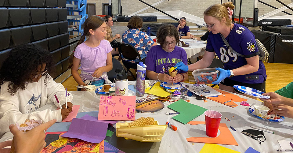 camp charm city campers making a diabetic friendly snack