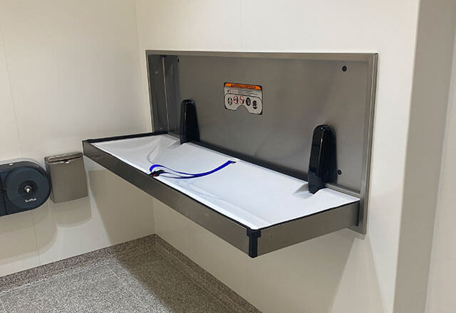 ADA restroom changing table