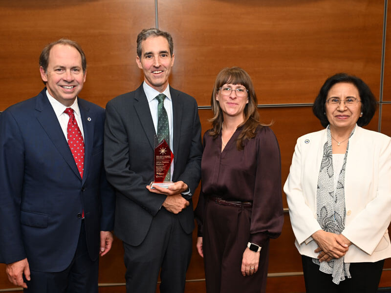 Aaron Milstone and Danielle Koontz accept Joint Commission Quality and Safety Award