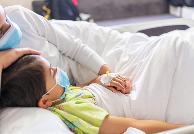 mother and child in a hospital bed