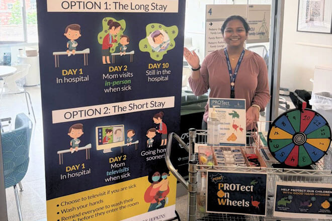 Project Protect team members with cart