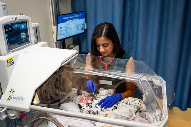 Suneetha Desiraju with baby in NICU