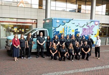 Pediatric Transport team in front of an ambulance 