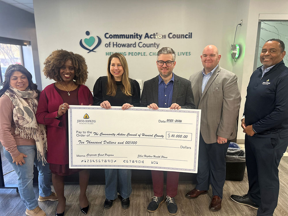 check presented to Howard Community Action Council