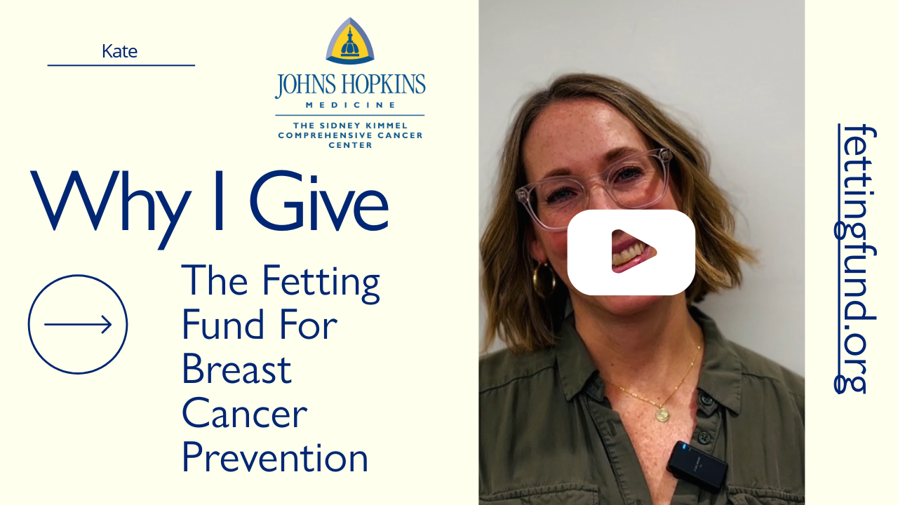 A woman smiling, wearing glasses and a green shirt, next to text promoting the Fetting Fund for Breast Cancer Prevention. Includes Johns Hopkins Medicine logo, URL fettingfund.org, and message 'Why I Give' for cancer prevention awareness."