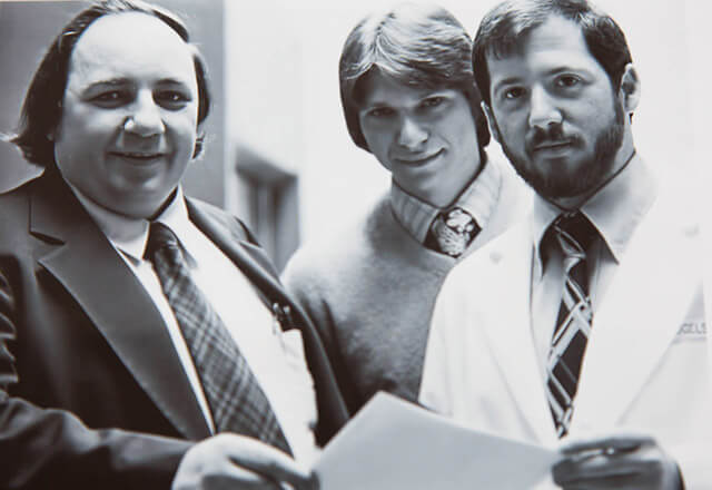 Black and white photograph of cancer researchers Donald Coffey, Drew Pardoll and Bert Vogelstein