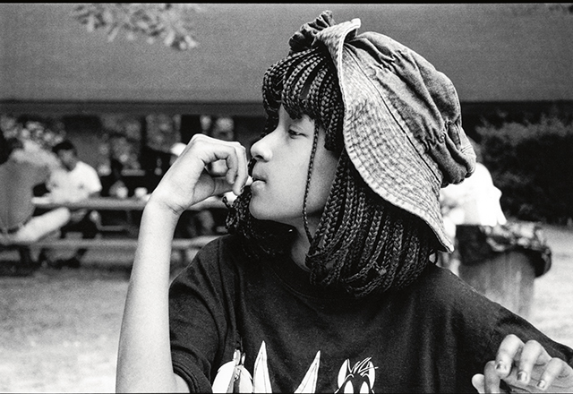 Young Heather looking off to the side.