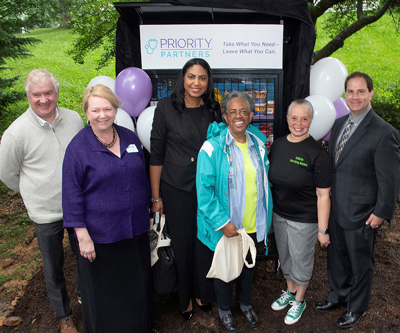 Priority Partners and community members at grand opening of new self-serve mini-pantry in Prince George's County