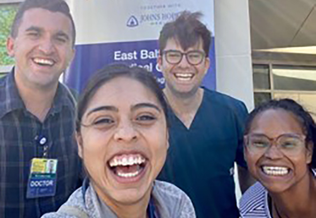 Residents take a selfie while at an event.