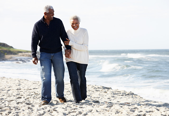 elderly couple on a beach