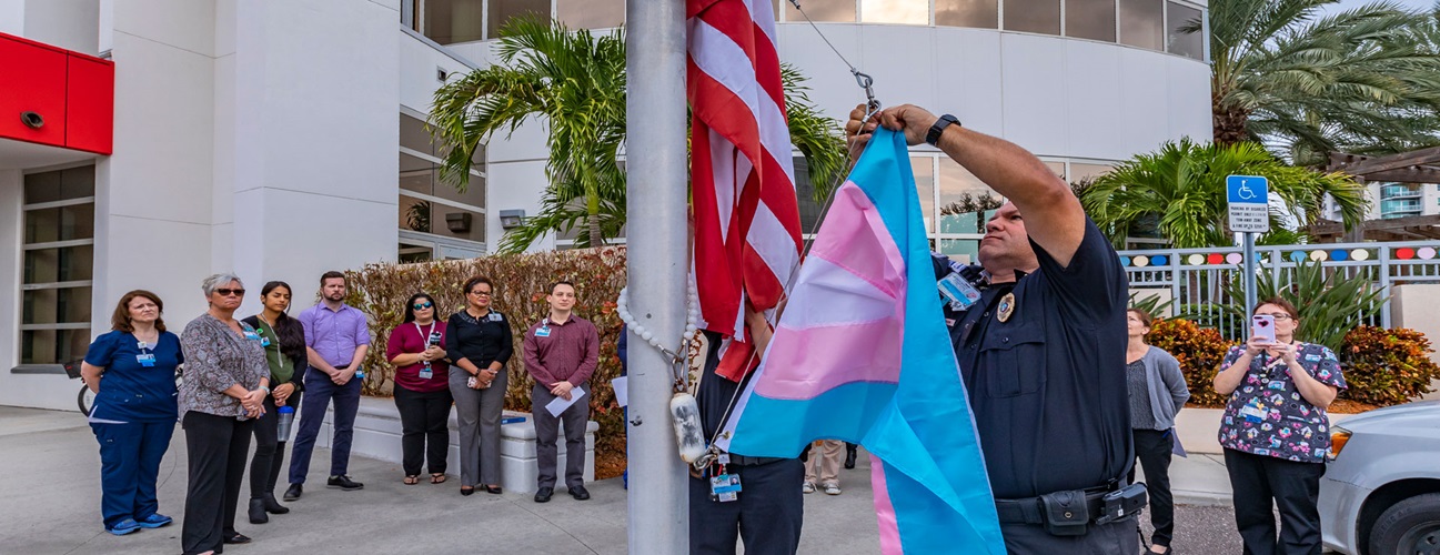Raising the transgender pride flag to commemorate the 2018 Transgender day of awareness at Johns Hopkins All Children's Hospital