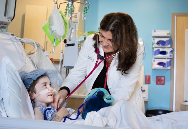 Owen and Dr. Stock in the CVICU at Johns Hopkins All Children's
