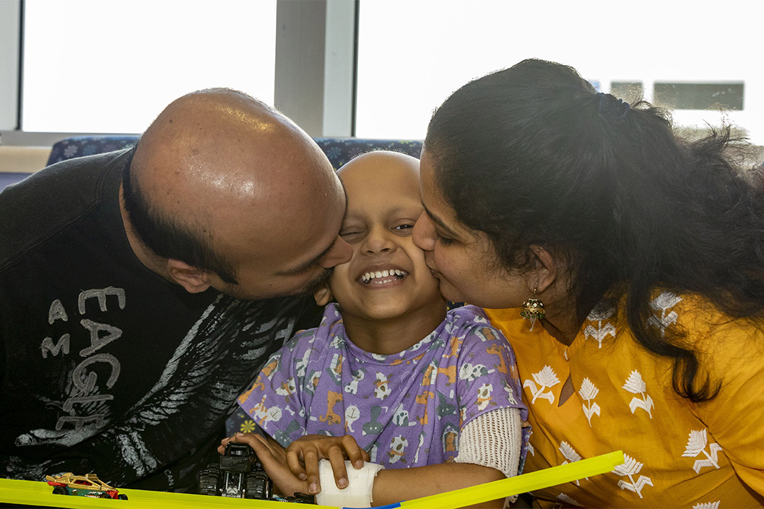 Advaith with his parents at Johns Hopkins All Children's Hospital