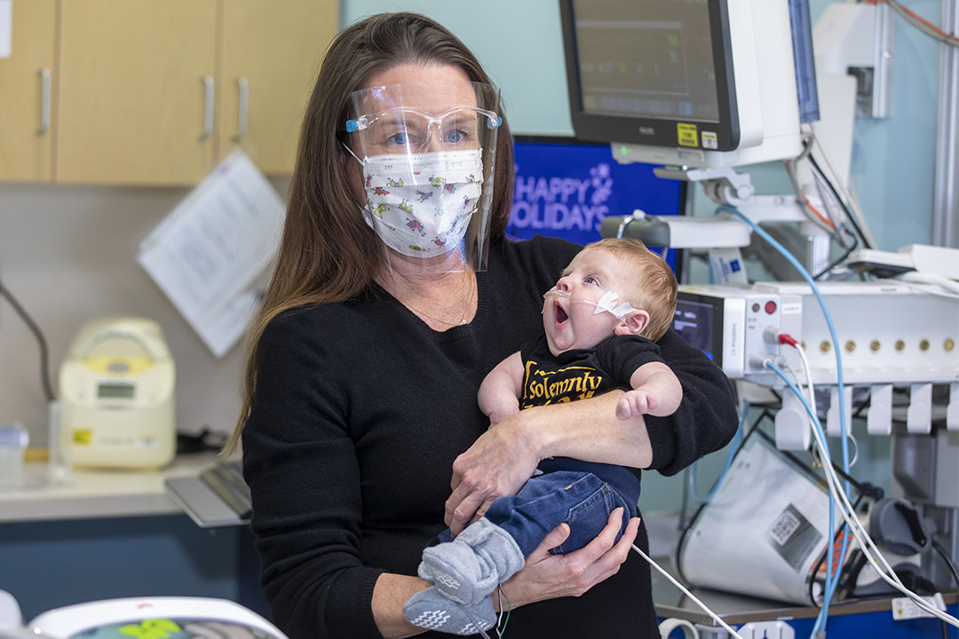 Stacey Stone, M.D., with Waylon, who is going home from the CDH unit.