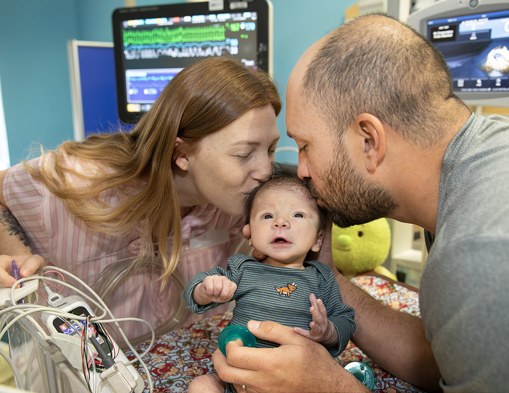 Diagnosed before birth with a complex congenital heart defect, one-year-old Liam has overcome multiple surgeries, life-threatening setbacks, and weeks on ECMO with resilience, joy, and the support of his family and care team at Johns Hopkins All Children’s Hospital.