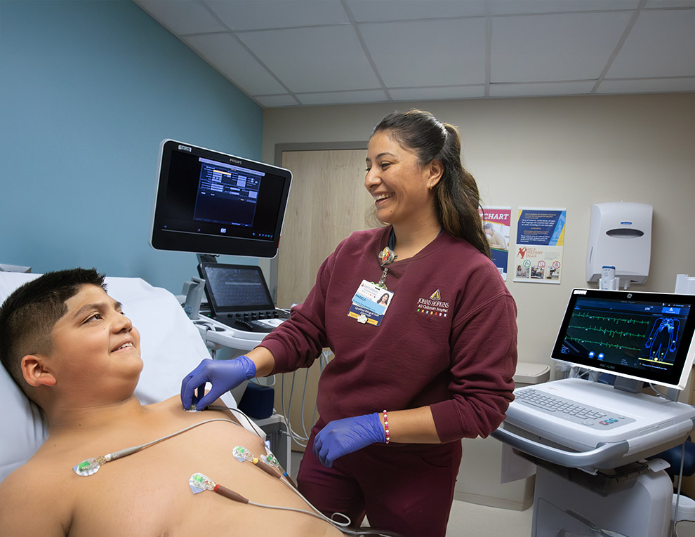Image: Picture of a young man receiving an electrocardiogram