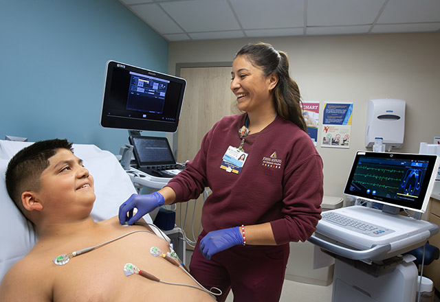 Image: Picture of a young man receiving an electrocardiogram