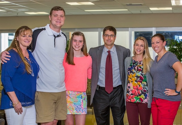 Patients Emily and T.J. and family with Dr. Goldenberg