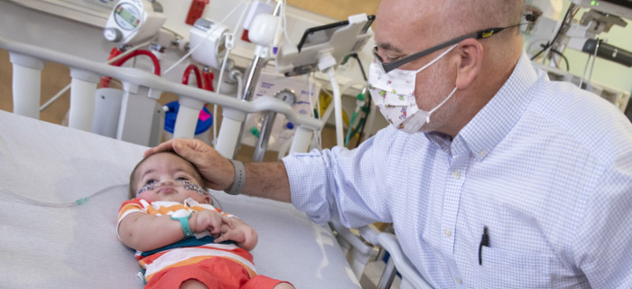 Patient baby Cristian with Dr. David Kays at Johns Hopkins All Children's Hospital
