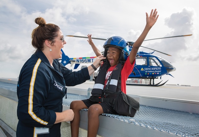 LifeLine team member with child
