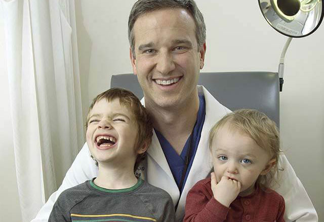 Dr. Jackson with the two brothers