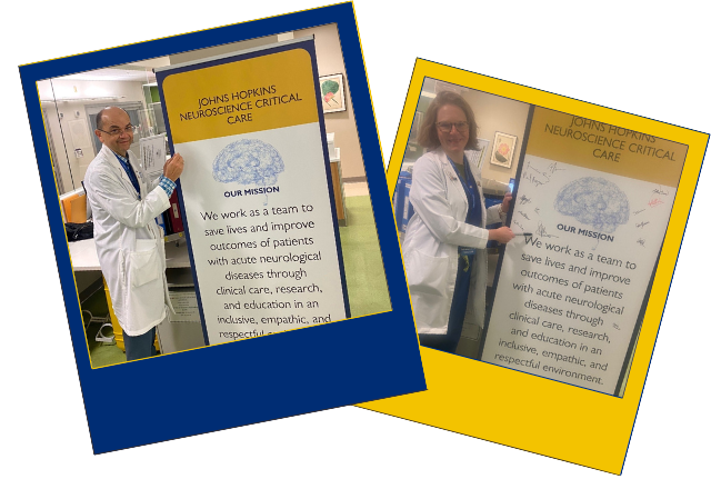 Two NCCU doctors posing next to a standing banner with a mission statement they signed.