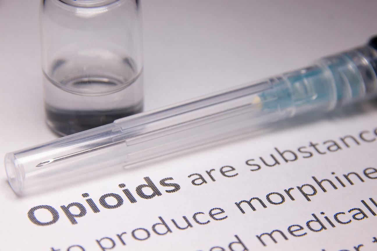 needle next two the word opioid