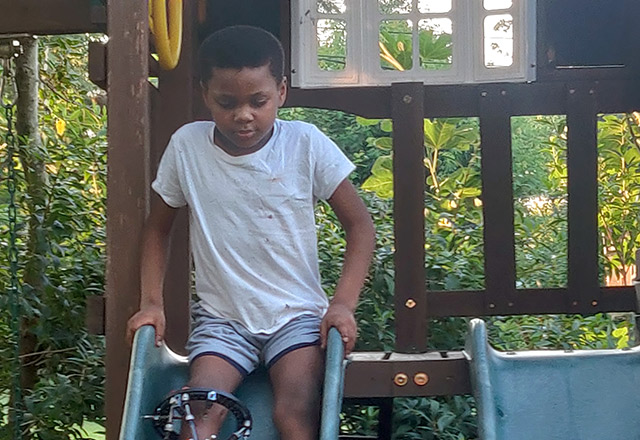 Amir going down the slide