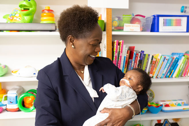 Ajoke Ajayi-Akintade with young patient