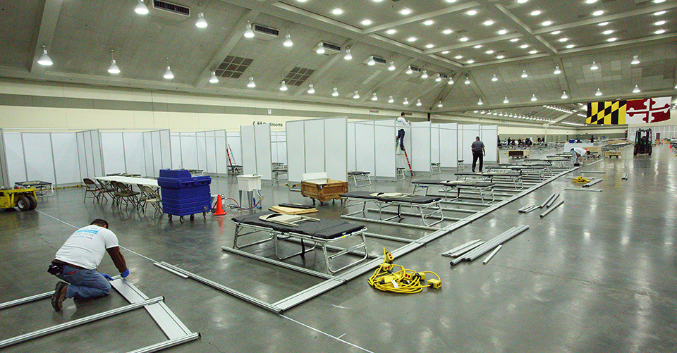 Person working on construction in the Baltimore Convention Center Field Hospital.