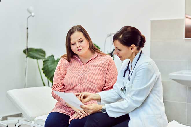 Doctor discussing bariatric surgery with patient