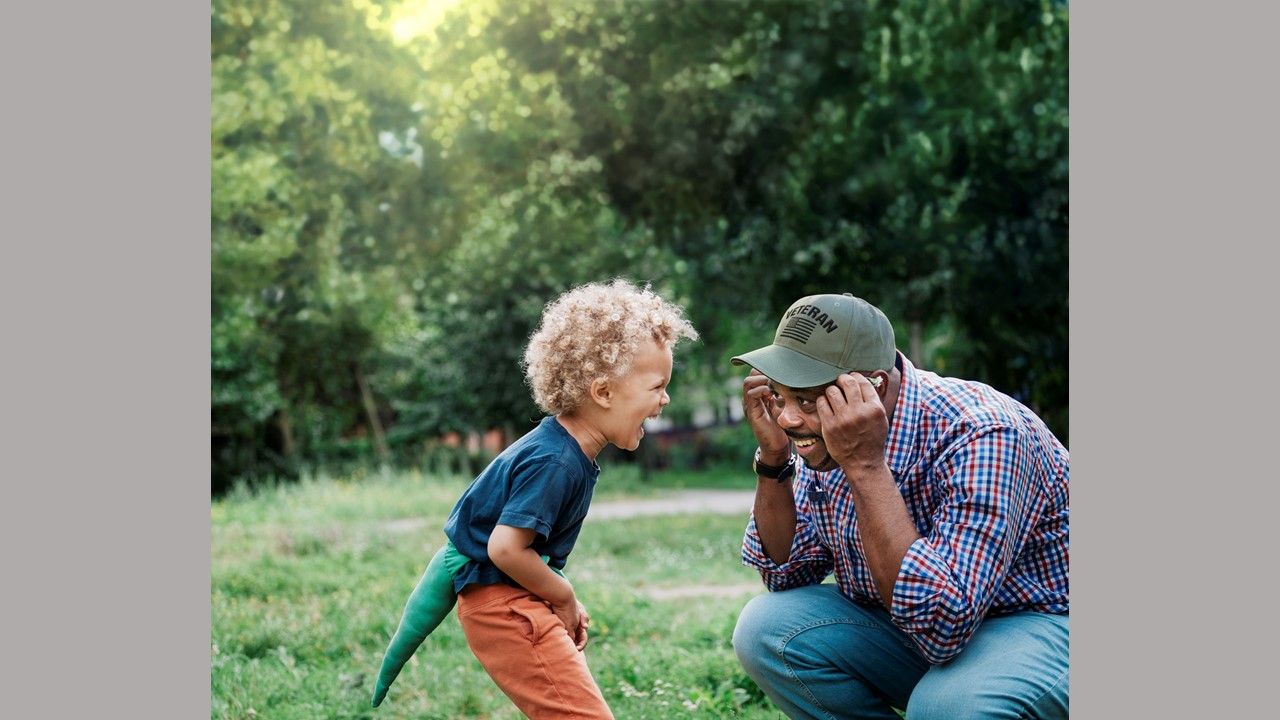 veteran with a small child