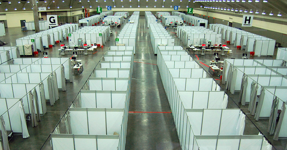 Rows of cubicles inside the Baltimore Convention Center Field Hospital.