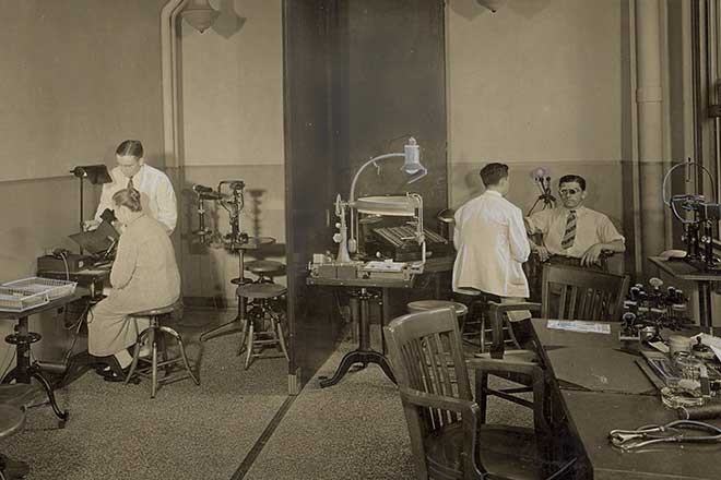 Black and white photograph of a medical clinic room from 1929