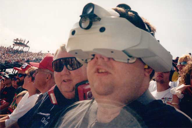 Tommy using an LVES device at a Nascar race