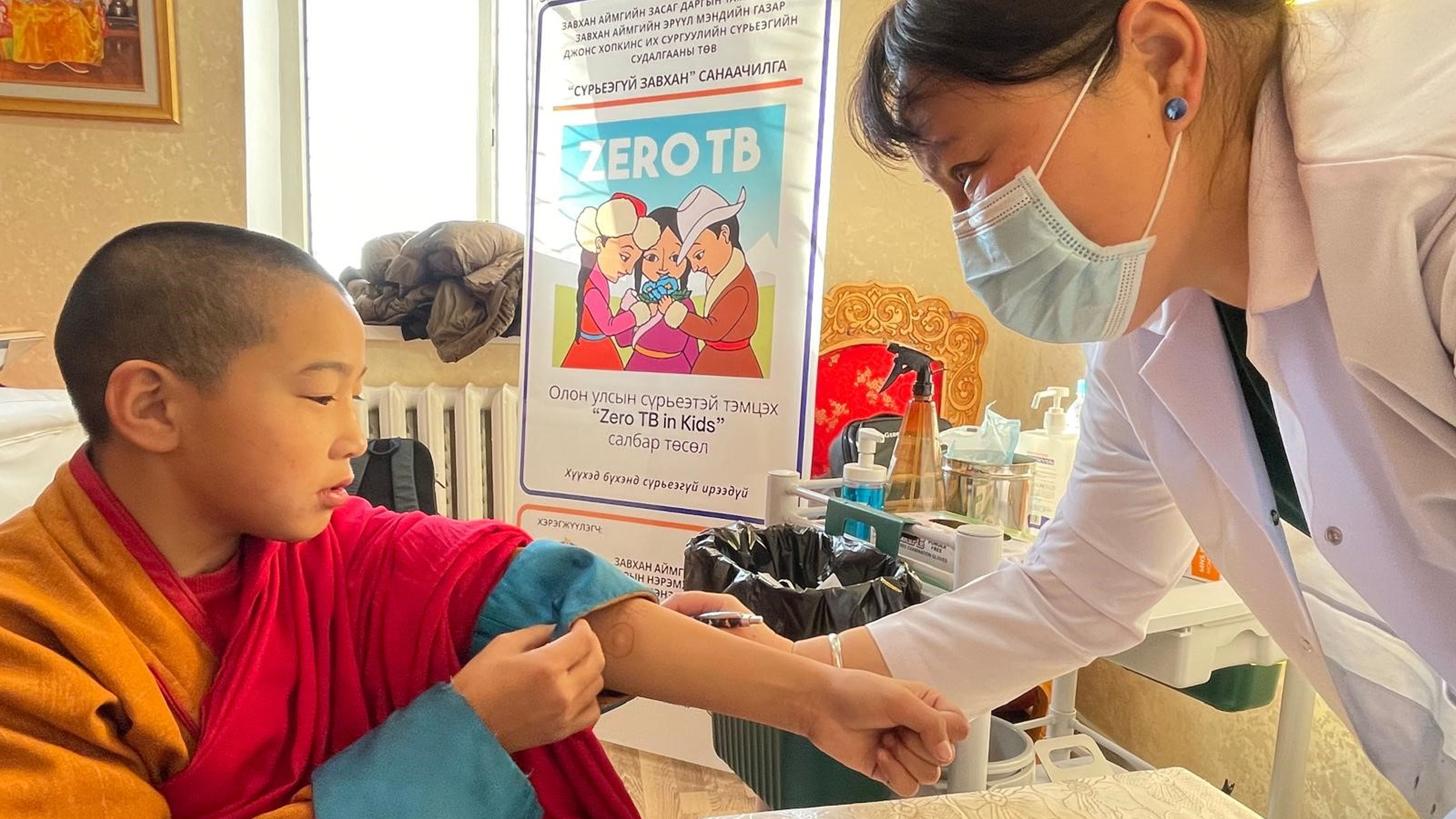child receiving TB shot