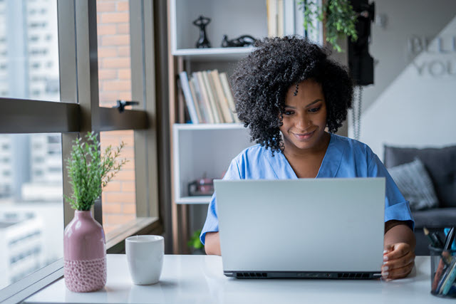 Nurse at Laptop_Abstract Writing