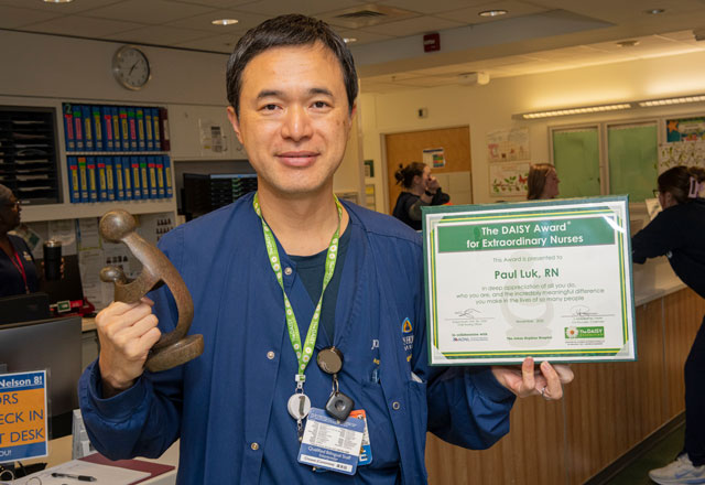 Paul Luk with his DAISY Award win