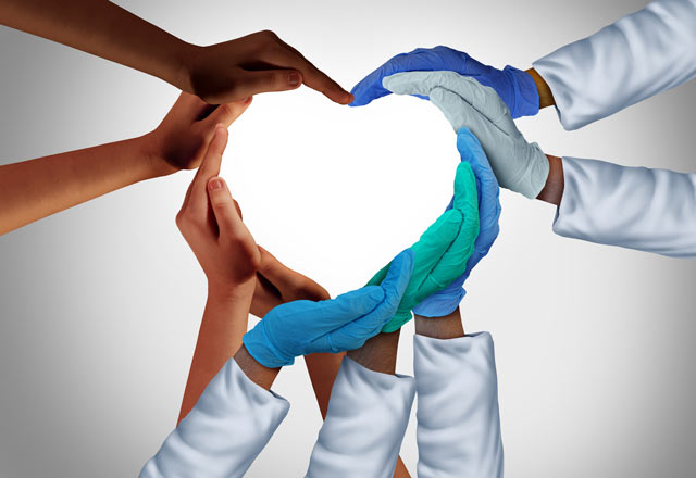 Doctor hands coming together to form a heart