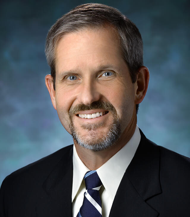 Headshot of James Ficke