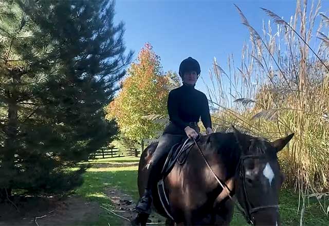 Anne riding a horse
