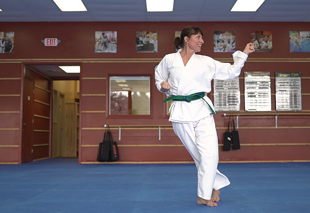 Michelle practicing martial arts.