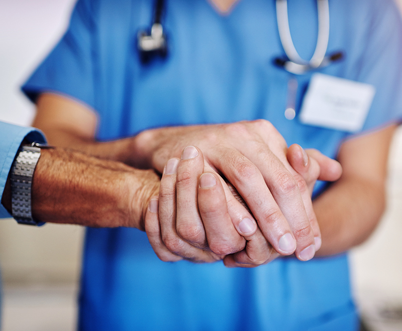 doctor comforting patient