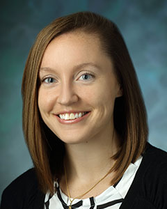 headshot of Megan Cima