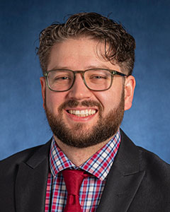 Headshot of Evan King