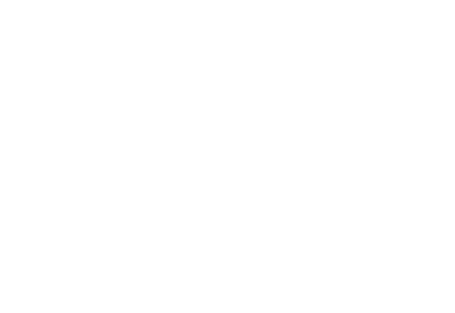 An icon of a soccer ball with movement lines following.