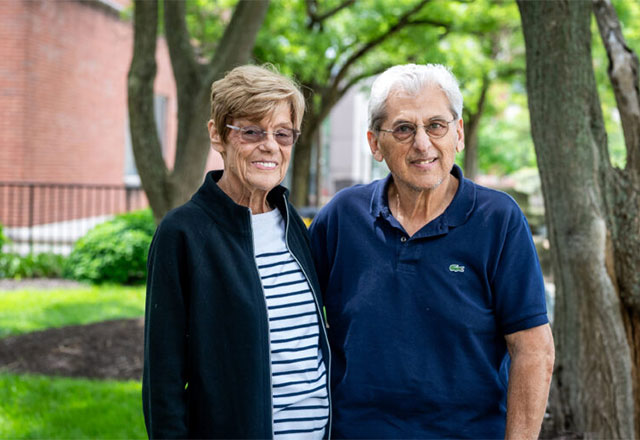 Laura and Tony Roussos standing outside of Johns Hopkins Bayview Medical Center