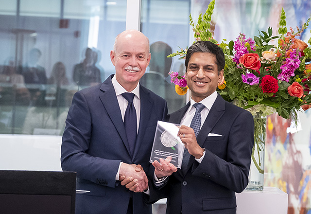 Drs DeWeese and Reddy with award