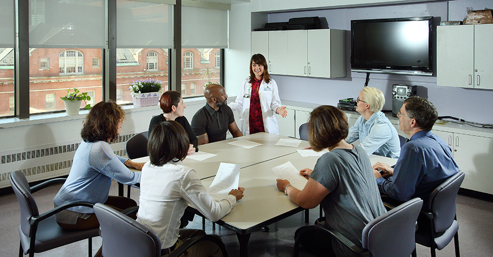 The team meets to discuss.